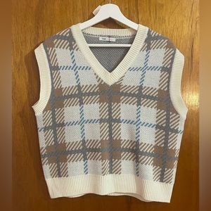 Cream colored sweater vest
